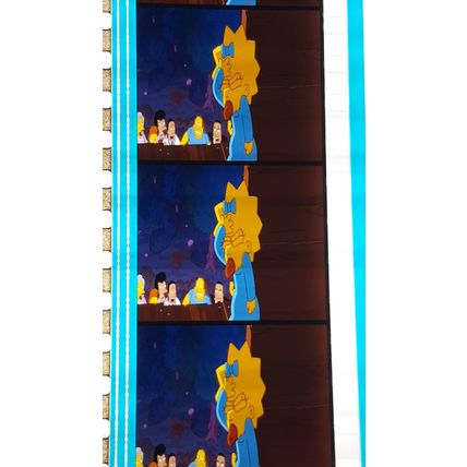 Simpsons Movie. Pk FE FE - 009i. 1 STRIP OF 5 - 35MM FILM CELLS