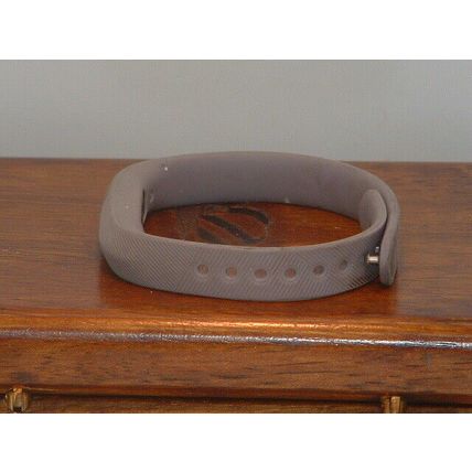 Pre-Owned Slim Grey Fitbit Smartband (For Parts)