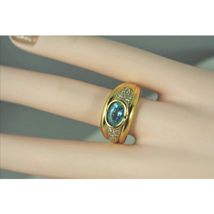 Massive solid gold ring with blue bezel set topaz Stamped fine gold jewelry