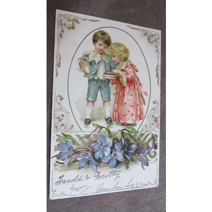 1904 Fr Ernest Nister Greeting Postcard - Boy & Girl with chocolates - Artist