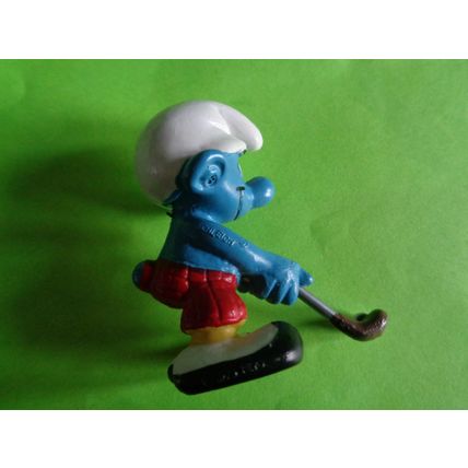 Golfer smurf complete with his golf club red trousers
