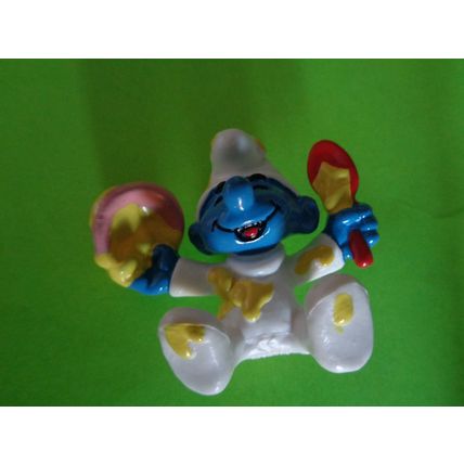 Baby smurf with spoon and bowl