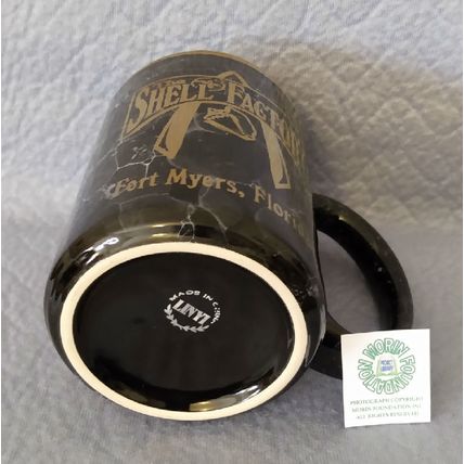 SHELL FACTORY FORT MYERS FLORIDA BLACK MARBLE-STYLE COFFEE MUG with GOLD LOGO