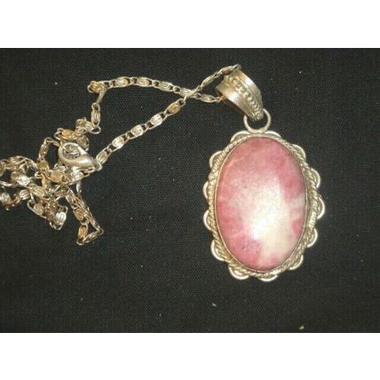 Mounted Rhodochrosite oval pendant and necklace connects energy healing