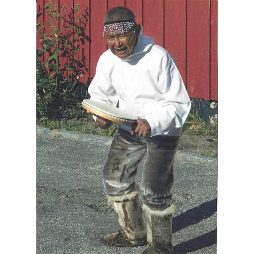 BET.G529: Drum dancer Jerimias Sanimuniaq playing his drum