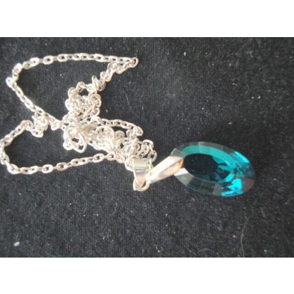 Stunning electric blue faceted oval pendant on snake chain necklace
