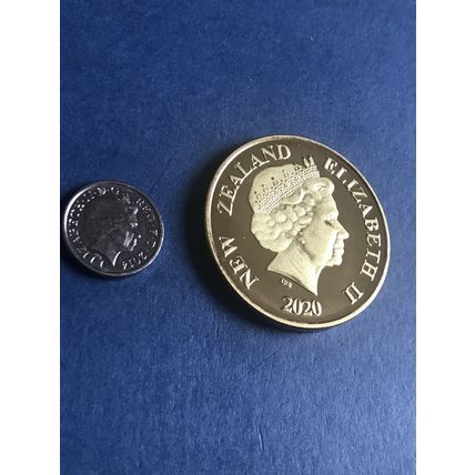 Genuine Mickey Mouse gold plated coin comes in a protective plastic case