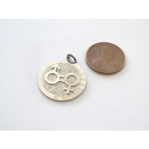 UNUSED 22MM STERLING SILVER MALE/FEMALE CHARM/PENDANT*NO RESERVE