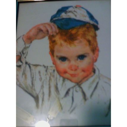 Young boy with Baseball cap framed