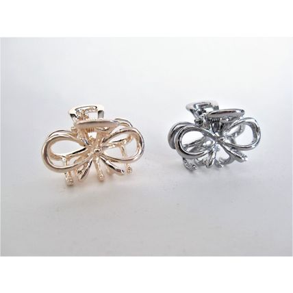 Tiny small dark silver or rose gold bow tie metal hair claw clip