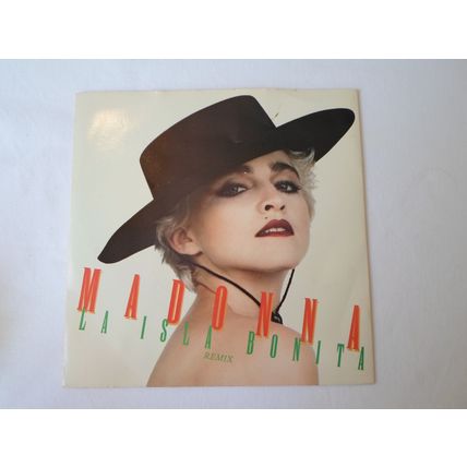7"MADONNA 1987. LA ISLA BONITA ( REMIX) W8378, 928378-7. YELLOW LABEL.NEAR MINT