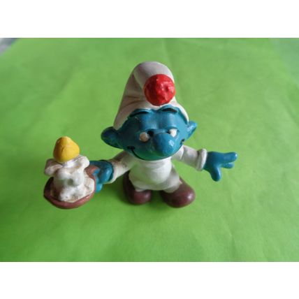 Smurf with a candle
