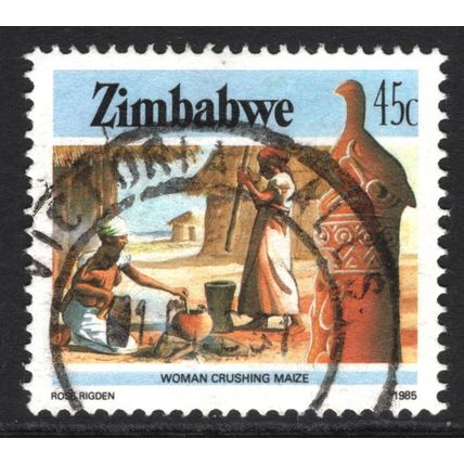 ZIMBABWE 1985: WOMAN CRUSHING MAIZE - 45c USED (G16)