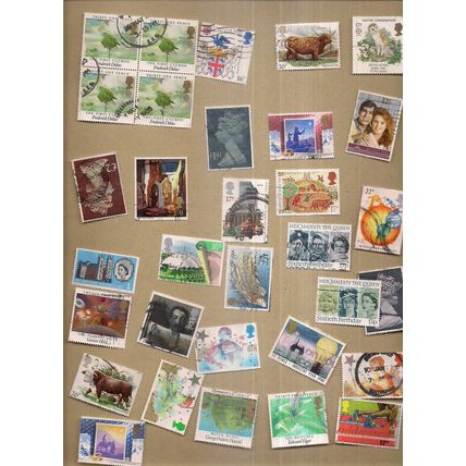 32 x Great Britain used postage stamps all been hinged in the past. =