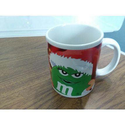 M&M , The GREEN Candy Character. Holiday Version Advertising. Coffee Mug Cup.