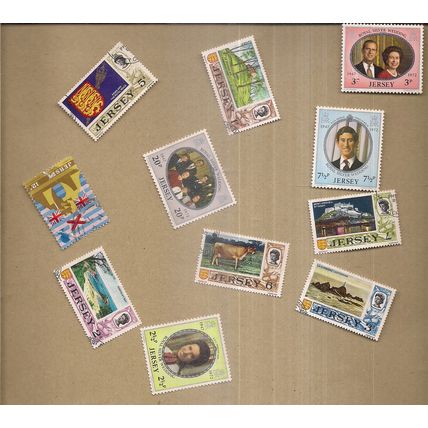 11 x JERSEY, CHANNEL ISLES stamps as seen all been hinged on the back =
