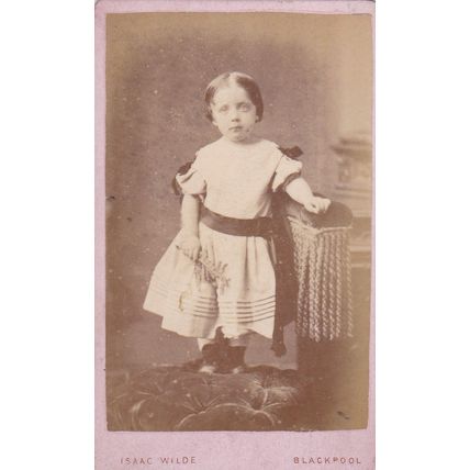 VICT.CDV PHOTO -SMALL GIRL ON CHAIR HOLDING FLOWER BY ISAAC WILDE, BLACKPOOL