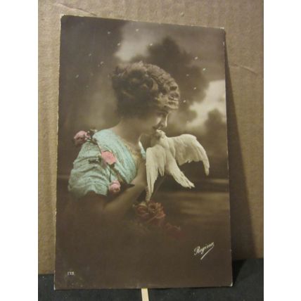 A PRETTY YOUNG GIRL WITH ROSES and DOVE . unused antique postcard =