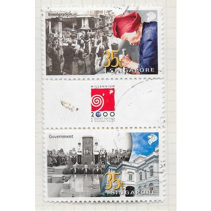 SINGAPORE 1999 VERTICAL GUTTER PAIR WITH LOGO IMMIGRATION GOVERNMENT USED