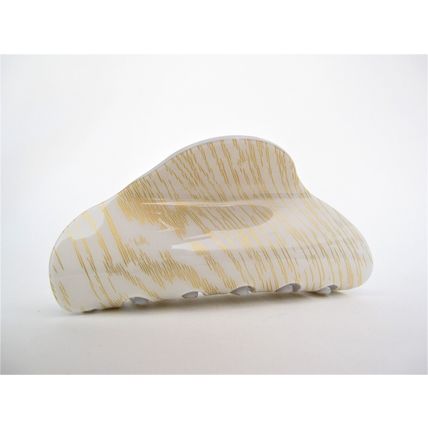 Long creme white blonde and gold hair claw clip