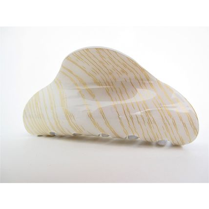 Long creme white blonde and gold hair claw clip