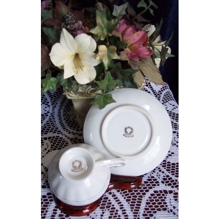 Marked in Gold MADE IN JAPAN Hand Painted Black & White Footed Teacup & Saucer