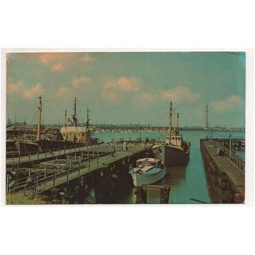 The new fish docks Grimsby Lincolnshire with trawlers early 70s postcard