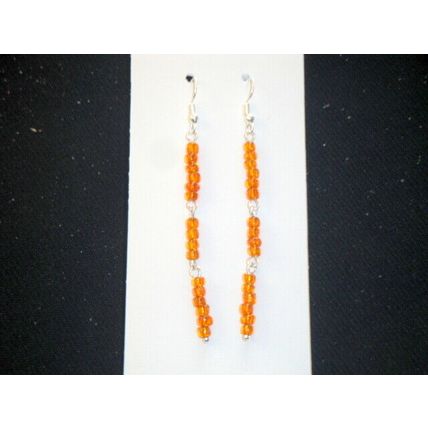Beautiful dark orange long drop slim earrings work play anywhere