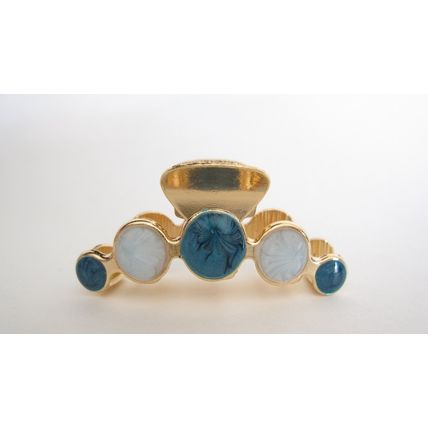 Small gold metal and blue marble hair claw clip