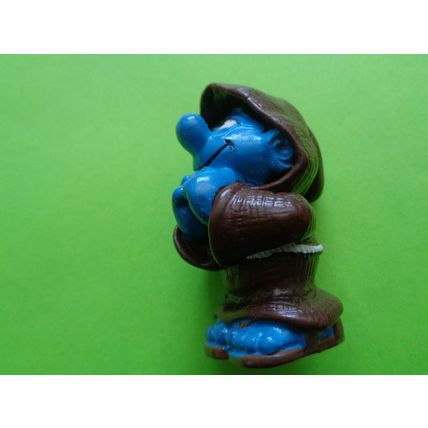 Smurf dressed up as a praying monk