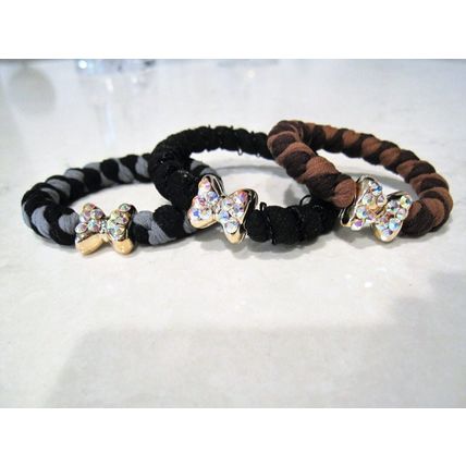 Bow shaped hair tie pony tail holder with swarovski crystals