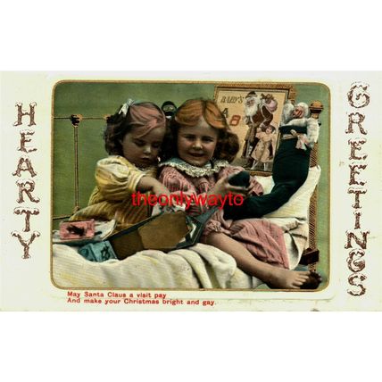 Hearty Greetings (Children on Bed With Christmas Sock), Philco Postcard, 1900s