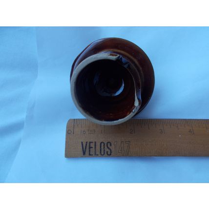 TEA POT LID BROWN HAS LITTLE BLACK ARROW ON TOP
