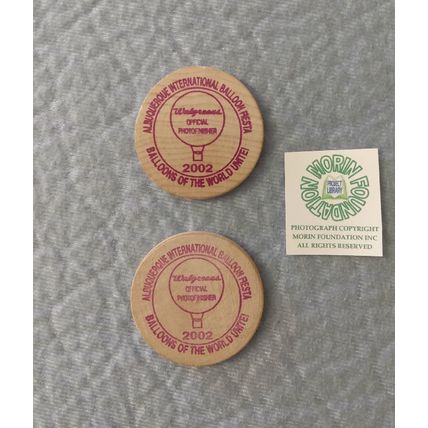 PAIR of 2002 ALBUQUERQUE INTERNATIONAL BALLOON FIESTA WOODEN 'NICKEL'