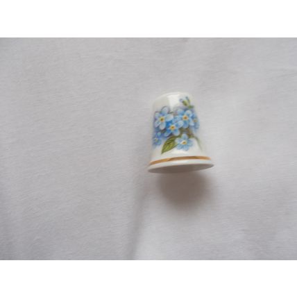 THIMBLE LIGHTBLUE FOWERS ( 17/10) #