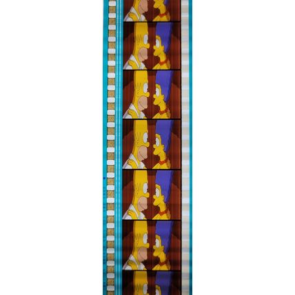 Simpsons Movie. Pk GEB - a016P . 1 STRIP OF 5 - 35MM FILM CELLS