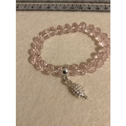 Light pink glass bead bracelet with hedgehog charm