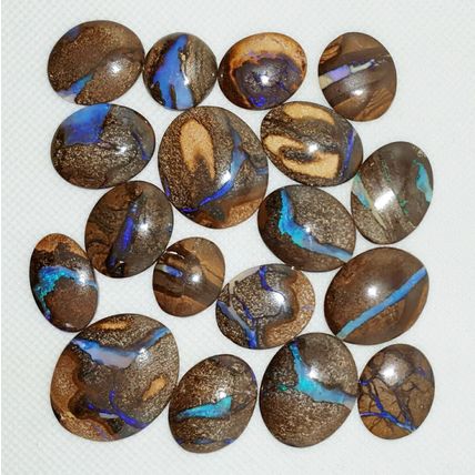 53464 - 18 Oval Cut Australian Boulder Opal with Blue Veins from 17x15 mm and up