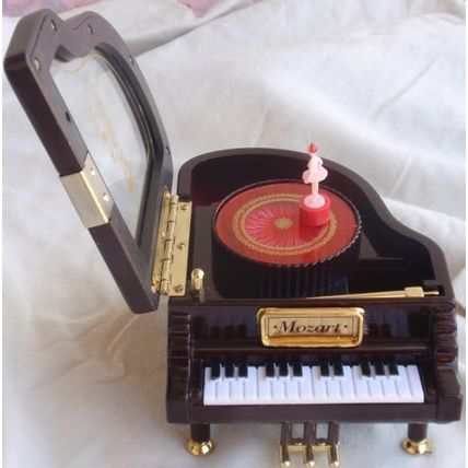 Playing piano wood miniature