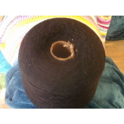 Large cone thin black yarn
