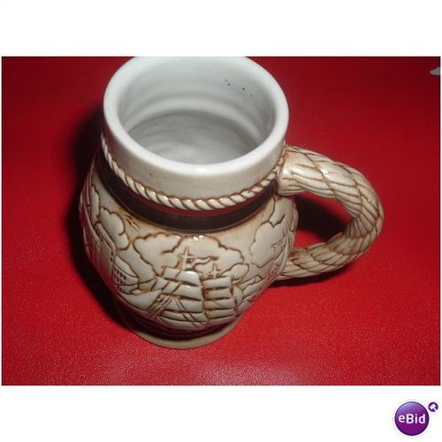 MUG STAMPED AVON SHAPED COLLECTABLE (03/02)