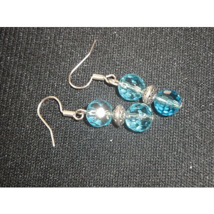 Staggering pair of multi faceted babby blue crystal glass short earrings