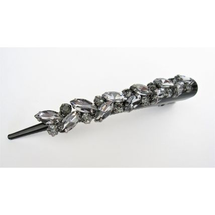 Black alligator hair claw clip with clusters of gray crystals