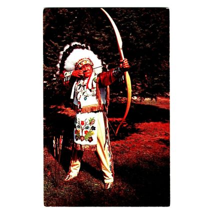 1957 Canadian Indian Chief in Full Dress Shooting Bow & Arrownposted in (A16)