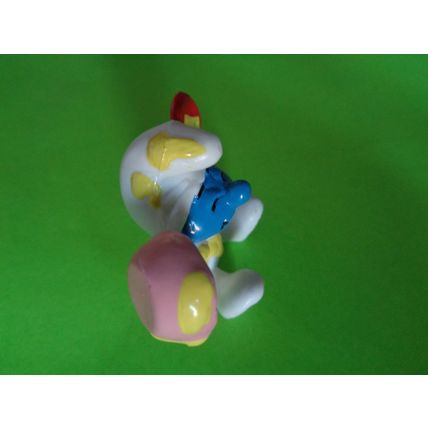 Baby smurf with spoon and bowl