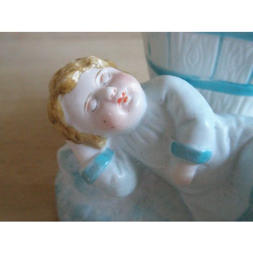 German Bisque Porcelain Sleeping Boy Spill Vase