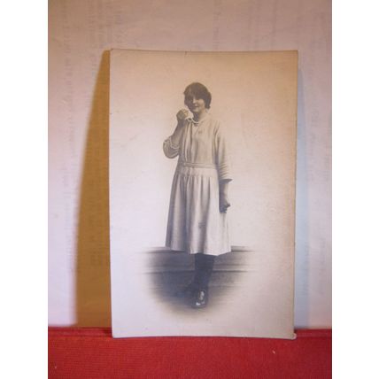 GIRL with necklace unused antique postcard by Chapman of Swansea. =
