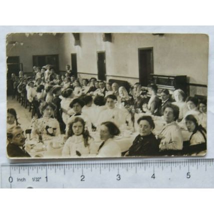 Vintage photo - lots of people seated at a reception / dinner
