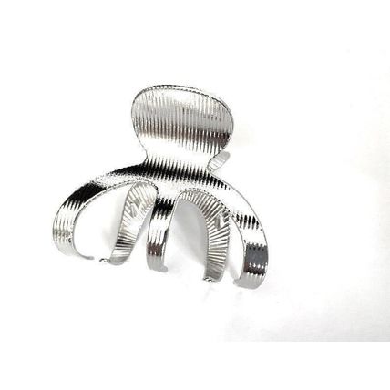 Medium shiny silver tone textured metal hair claw clip