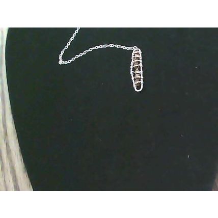 Gold Tone necklace with a triangular pendant and a rectangular pendant
